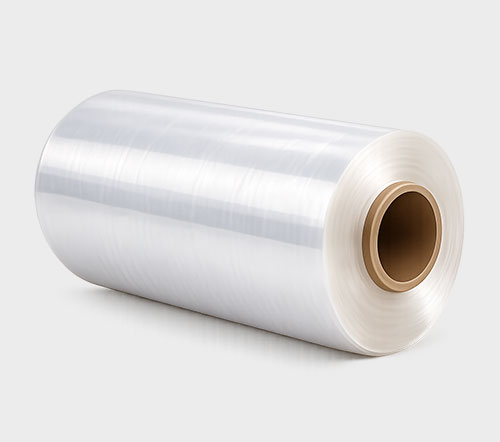 A large roll of clear plastic film with a brown cardboard core.