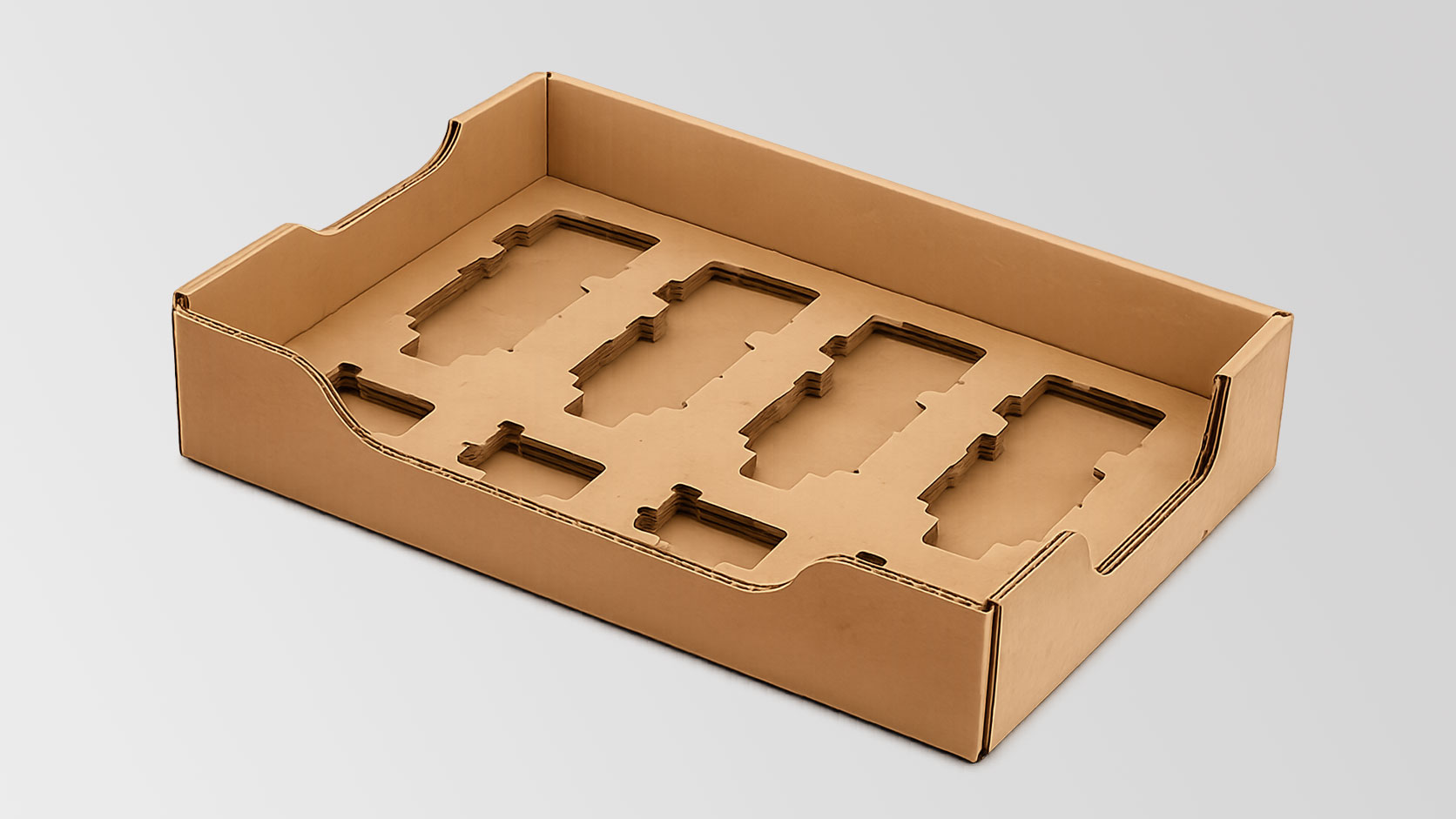 A brown cardboard tray with multiple cut-out slots for holding items, set against a light gray background.