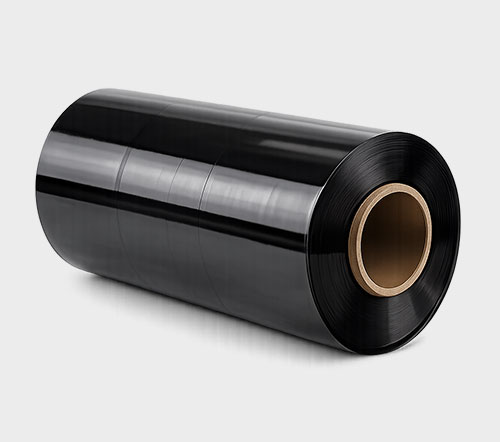 Large roll of black plastic film with a hollow cardboard core.