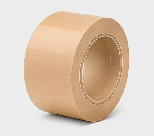 A large roll of brown adhesive tape on a gray background.