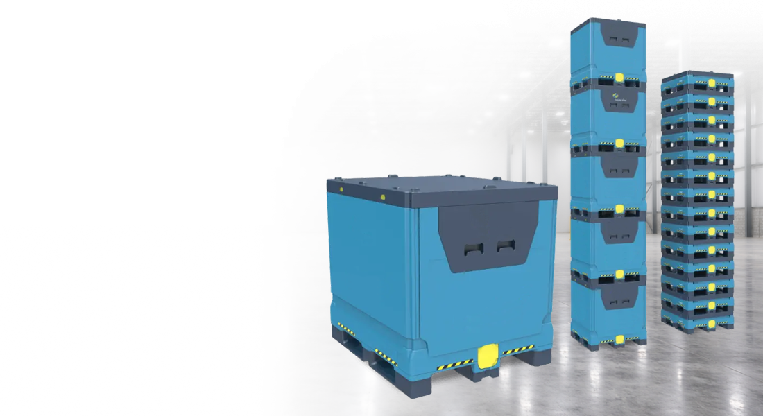 Blue industrial containers are stacked neatly on a polished warehouse floor. One large container sits next to a tall stack. The setting is industrial and orderly.