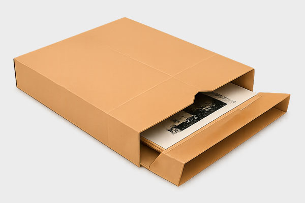 A tan archival storage box with contents partially visible.
