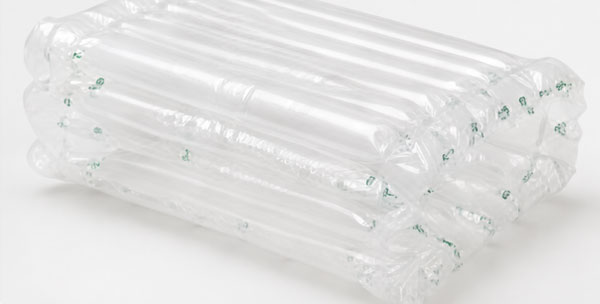 Stack of transparent air pillows used for packaging.