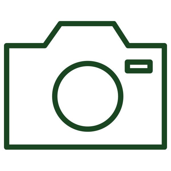 Green line drawing of a camera icon on a white background.