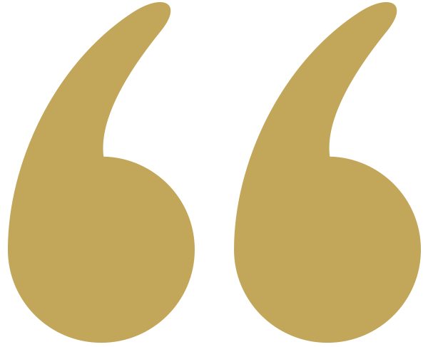 Golden quotation marks on a white background.